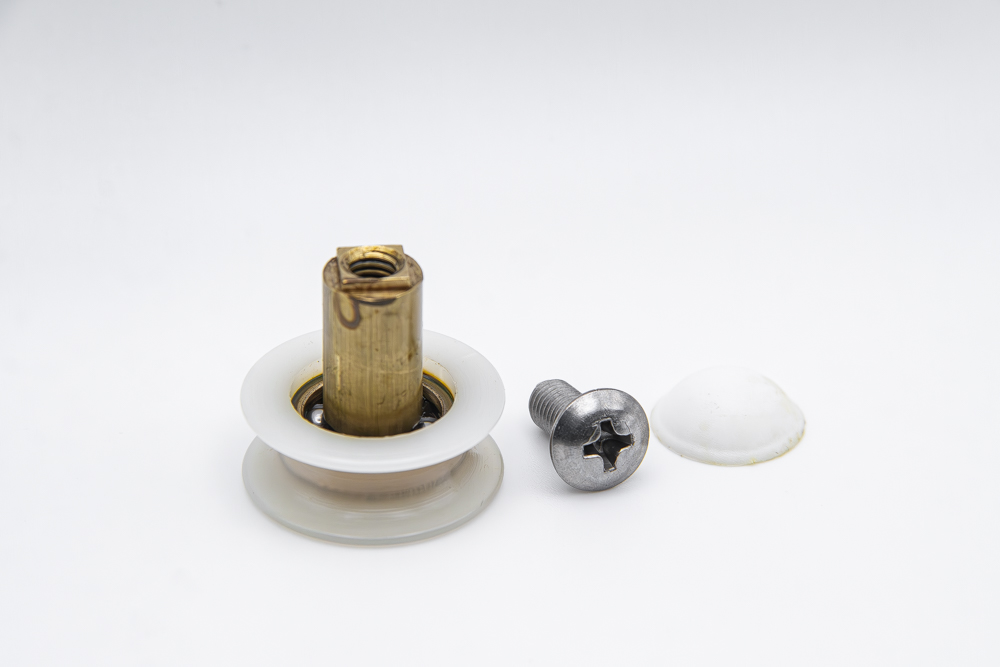 Rueda para mampara corredera angular con rodamiento de bolas, cuello largo, pista cóncava. Eje roscado M5, diámetro 24 mm, tornillo M5x10. RAN (6 unidades)