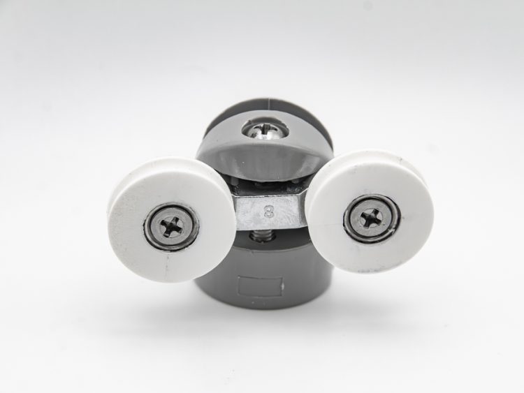 Rodamiento de polea doble articulado con soporte de nylon para mampara de ducha. Tornillo M4, diámetro rueda 22 mm. - RAN (2 unidades)