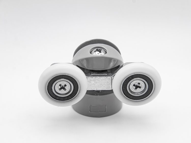 Juego de rodamientos doble articulado con soporte de nylon para mampara de ducha. Tornillos M4, diámetro rueda 23 mm. RAN (2 unidades)