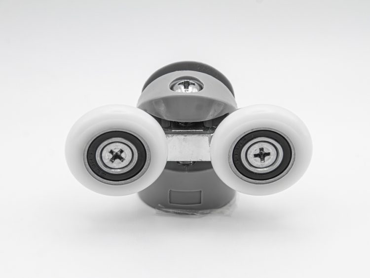 Rodamiento doble articulado con soporte de nylon para mampara de ducha. Tornillo M4, diámetro rueda 25 mm. RAN (2 unidades)